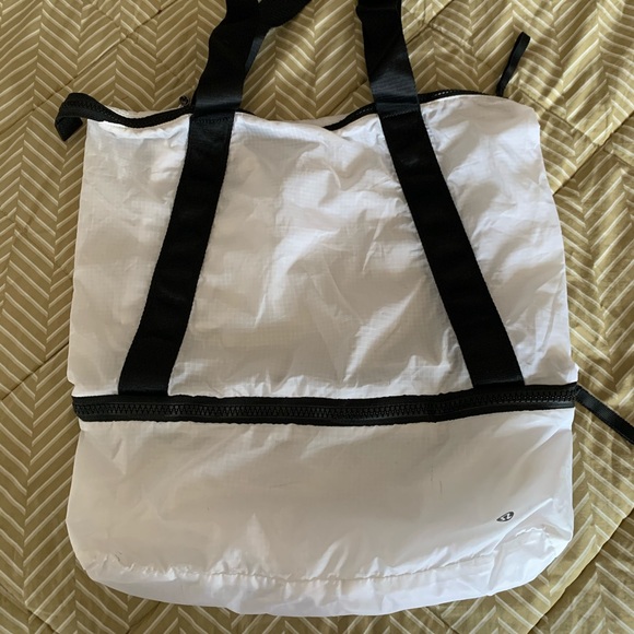 lululemon athletica Handbags - Lululemon Pack Lightly Bag